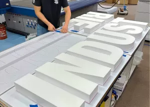 Floating Letters Sign: Industrie x DCR